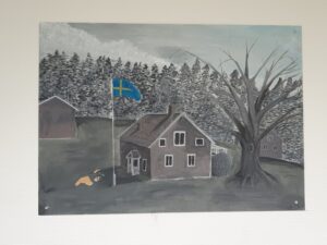 Das Bild zeigt ein gemaltes Bild eines schwedischen Häuschens